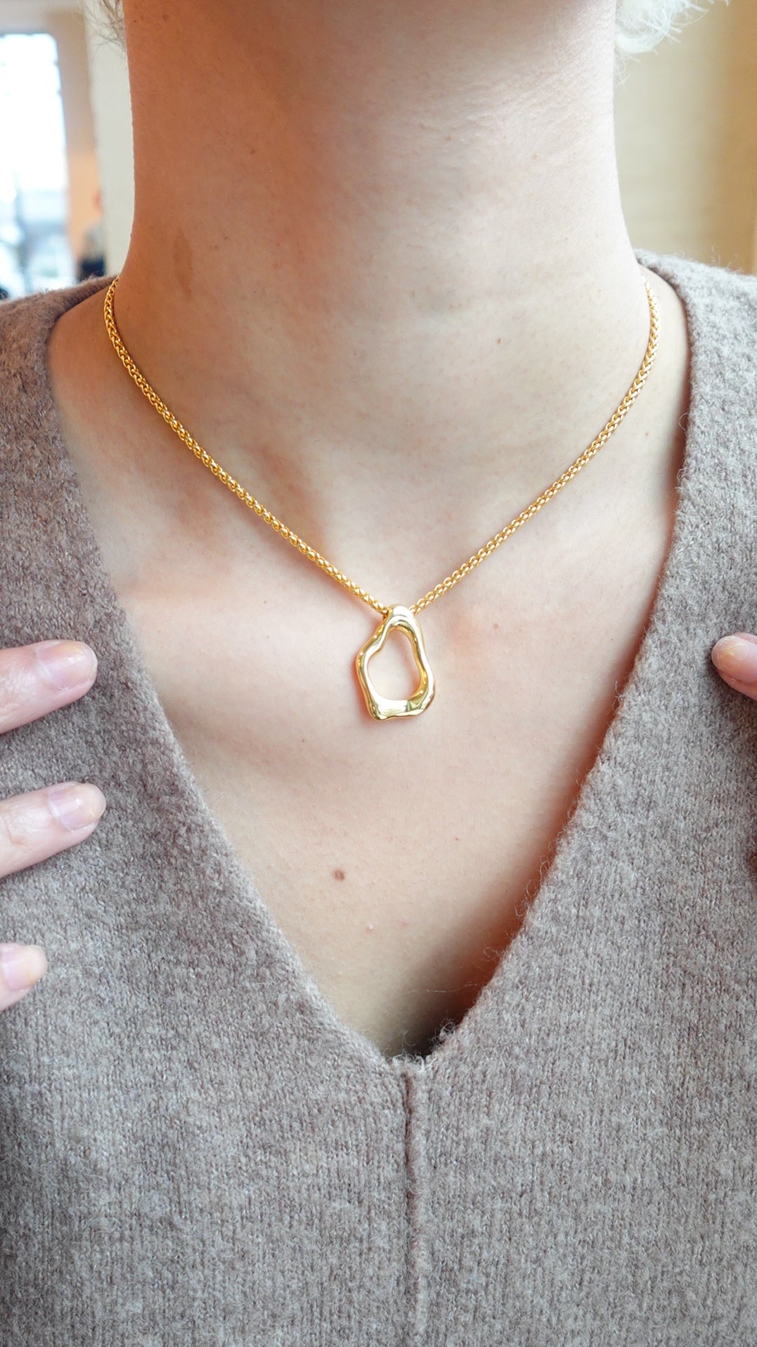 Gold necklace with a siluet charm minimalists 